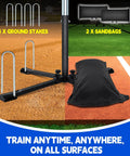 Auto Reset Baseball And Softball Hitting Tee with X-base, stakes, and sandbag on field