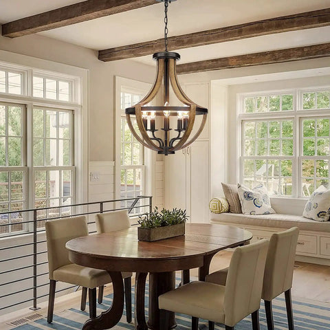 Modern Farmhouse Geometric 5 Light Chandelier With Adjustable Height Rustic Pendant Lighting For Dining Room Foyer And Kitchen Island In Black Wood Grain Finish With A Cool Vibe hanging over dining table.