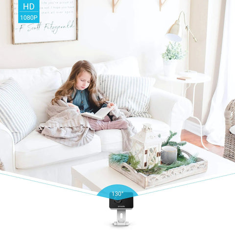 1080P Mini WiFi Pet Camera With Night Vision And Two Way Audio in living room with wide 130° view of a child reading on a couch