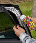 Applying Rubber Adhesive Sealant Caulk Eight Ounce Clear Flexible Bonding Sealant to a car door seal to prevent leaks.