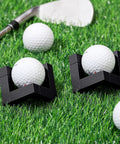 Wooden Golf Ball Display Stand 1.97 Inch Black Display Case on grass with golf balls and a club.