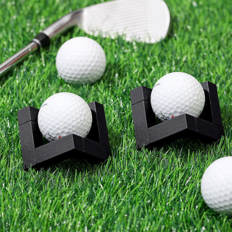 Wooden Golf Ball Display Stand 1.97 Inch Black Display Case on grass with golf balls and a club.