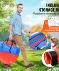 Person carrying storage bag of Dog Agility Training Gear Set With Adjustable Hurdles And Extended Tunnel outdoors.