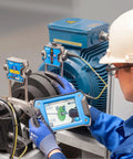 Engineer using Wireless Laser Shaft Alignment System With Automatic Measurement For Safe No Sweat Alignment In Tight Spaces Starts At Any Angle And Finishes With A 90 Degree Sweep Ideal For Industrial Machinery And High Precision Maintenance on machinery