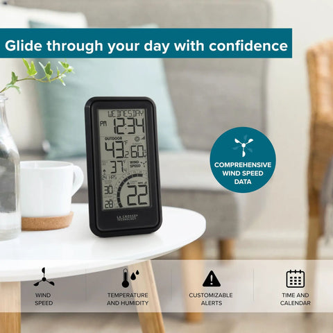 Monochromatic Digital Wind Speed Station With Indoor Outdoor Temperature And Humidity on a table with display features