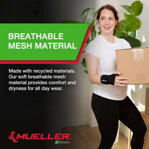 Woman wearing Green Fitted Left Wrist Brace With One Hand Cinch For Easy Wraparound And Stay Put Support holding box