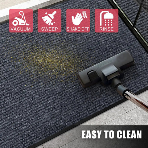 Front Door Mat 3 By 4 Ft Indoor Outdoor Entrance Rug With Non Slip Rubber Backing in dark gray being vacuumed