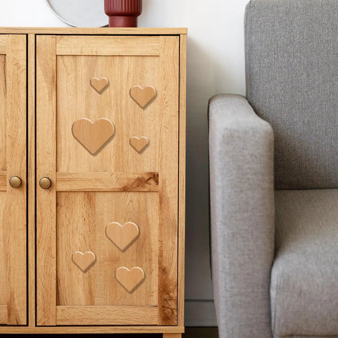 Heavy Duty Acrylic Heart Router Template For Practical Woodworking And Charcuterie Boards Features Twelve Cut Sizes Providing Flawless Trimming Lines on a wooden cabinet.