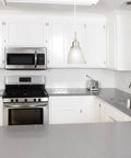 Modern kitchen with white cabinets and brushed nickel cabinet hinges self closing half inch overlay flush mount for kitchen cabinets doors.