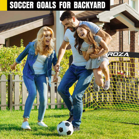 Family playing soccer in backyard with Backyard Kids Soccer Goal Set 2 Pack 4x3 Ft Portable Pop Up Net With Soccer Ball And Cones