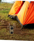 Six-Piece Adjustable Camping Tent Pole Kit with Heavy-Duty Aluminum Stakes beside orange tent in outdoor setting