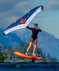 Person using Ultrafly Wing Foil Board 105 L Inflatable Travel Ready Packable Setup With Rapid Release System on water