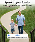 Man and child walking on a path, demonstrating 2-way talk feature of Outdoor Solar And Battery Powered Security Camera System With 2K Video.
