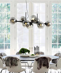 Black Glass Ball LED Pendant Light Transparent Globe Housing Decorative Hanging Fixture Chandelier Ceiling Light above dining table.
