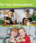 Printable vinyl sticker paper; kids cut Halloween spider and pumpkin stickers and show Christmas circular stickers