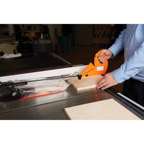 Person using 11 In 1 Table Saw Push Stick With Rear Hook And Toe Grip Angle Guides for precise safe cuts on table saw