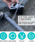 Hand applying Flexible Rubberized Waterproof Tape 4 Inch 5 Foot Patch And Seal For Leaks Works Underwater Like A Boss Indoor Outdoor Use Roof Plumbing Pool And RV Repairs Black on leaking pipe.