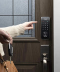 Person using Smart Door Lock Deadbolt With Touchscreen Keypad, Pin Codes And Key Entry, Bluetooth Remote Unlock, Up To 20 Access Codes, Gold Finish