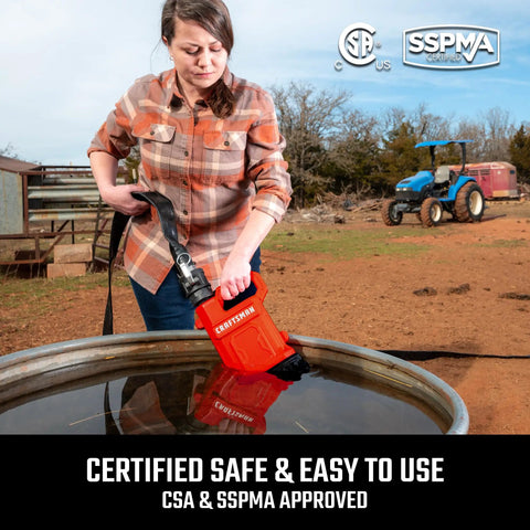 Heavy Duty One Half Horsepower Submersible Water Utility Transfer Pump With 25 Foot Lay Flat Hose used by a woman in a yard.