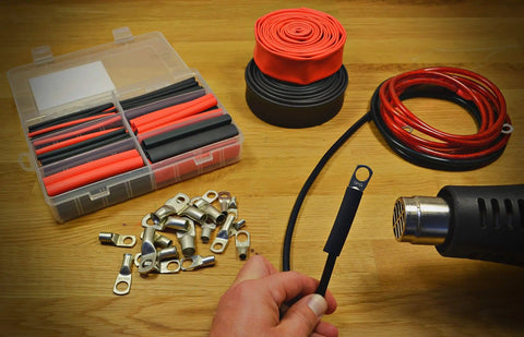 Pro Grade 130 Piece Dual Wall Adhesive Marine Heat Shrink Kit With Multi Color Tubing And Three To One Shrink Ratio shown with tools