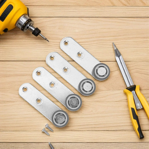 Heavy Duty Side Mount Casters For Sliding Closets And Barn Doors Featuring Solid Rubber Bottom Rollers on wooden surface with tools.