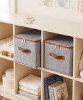 Top Shelf Washable Fabric Storage Bins With Zippered Lids And Sturdy Faux Handles Houndstooth Pattern on a shelf.
