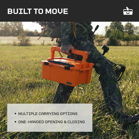 Person carrying the Sixer 16 Protective Case With Removable Tool Tray Blaze Orange in field, showing portability and rugged use.