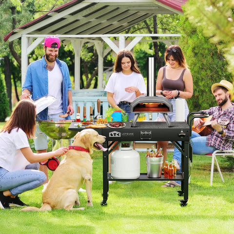 Portable Outdoor Grill Cart For Blackstone Griddle And Ninja Stand Foldable With Wheels in backyard gathering scene
