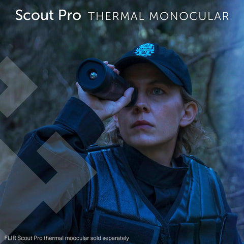 Person using Scout Pro thermal monocular in outdoor setting.