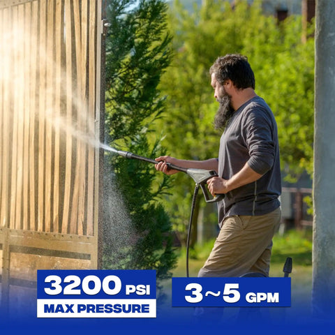 Man using pressure washer with Downstream Injector For Pressure Washer With 3/8 Inch Quick Connect And 10 Ft Siphon Hose Fixed Chemical Injector Kit For 3-5 GPM Easy Detergent Dosing For Cars Driveways Roofs And More Built For Heavy Duty Cleaning, spraying garden fence.