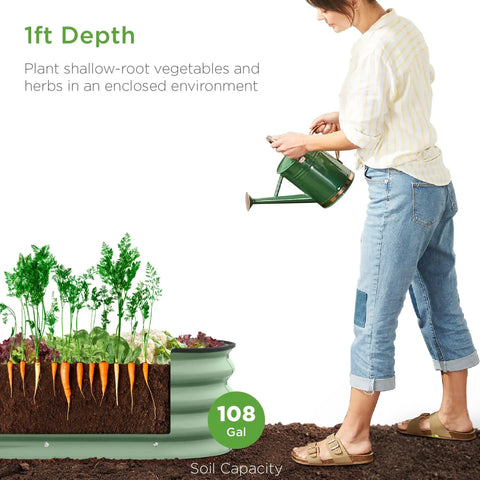 Woman watering an Oval Outdoor Metal Raised Garden Bed With 12 Inch Deep Planter For Veggies Herbs Flowers And Succulents, 8x2x1 Ft, 108 Gallon Capacity, Sage Green, Open Drainage Base showing soil layers and root depth.