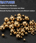 300 Pcs 4mm Brass Bearing Balls, Precision G100 Solid Brass Spheres for Machinery, Automotive, and DIY Projects, Durable, Corrosion Resistant for Water, Oil, Gas Environments. Brass balls on textured black surface