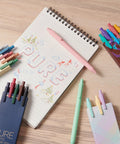 30 Color Gel Pens Set With 0.5 mm Fine Point For Journaling And Doodling, Smooth Writing, Vibrant Assorted Inks on notebook