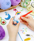 Hands using ergonomic hook from 113 Piece Crochet Kit With 1600 Yards Of 40 Color Assorted Acrylic Yarn For Knitting And Crochet