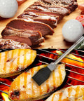 Golf Themed 8 Piece Barbecue Grill Utensils Set With Golf Club Spatula Golf Ball Tongs And Two Golf Ball Salt And Pepper Shakers with grilled meat and fish
