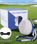 Golf Swing Training Ball With Forearm Connection And Correction Band For Consistent Impact, shown with packaging on grass