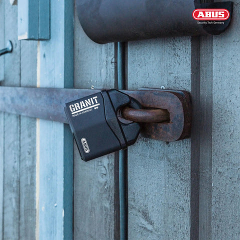 Granit 37/80 Beefy Heavy Duty Padlock With Hidden Closed Shackle 14mm on metal gate latch, outdoor use