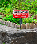 Heavy Duty No Dumping And No Littering Sign 2 Pack Rust Proof Aluminum Property Boundary Signs 12x6 Inches Clear warning sign in yard.