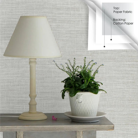 Marbletile Style Wallcovering Dope Gray Ivory White Grasscloth Texture 36 Inch Wide Roll 8 Yards Long Natural Paper Weave shown with lamp and plant.