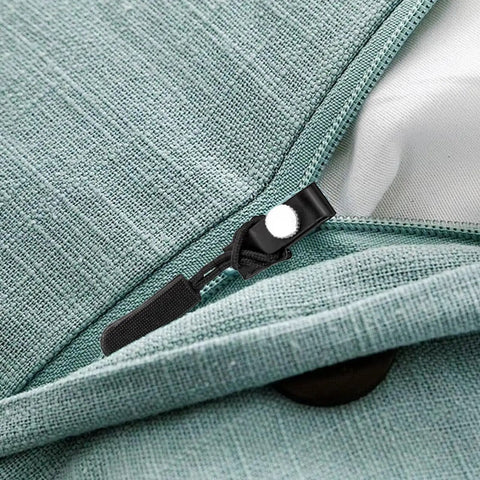 Close-up of Heavy Duty Zipper Slider Replacement Kit 10 Pack Easy Zip Puller Repair installed on a green fabric bag.