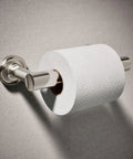 Purist Pivoting Toilet Paper Holder in Vibrant Polished Nickel with roll, slick durable metal bath accessory.