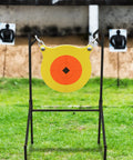 Boomslang AR500 Steel Shooting Gong Target 0.5 Inch Thick 9.5 Inch Diameter With Stand And Hanging Hardware on range