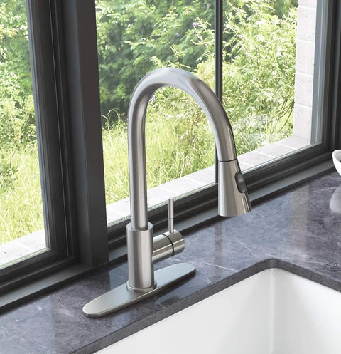 YZZY Single Handle Kitchen Sink Faucet with Pull Down Sprayer Stainless Steel Single Hole Bar Faucet High Arc Chrome Pull Out Kitchen Faucet next to window.