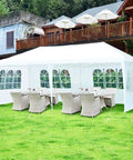10x20 Outdoor Party Tent Canopy With Removable Walls set up in backyard, white gazebo shelter with sidewalls and dining tables visible