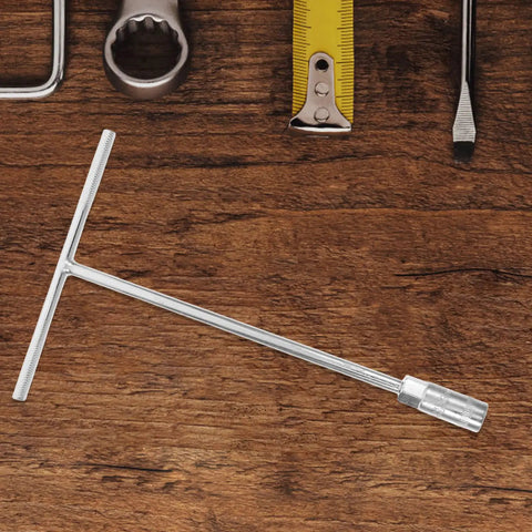 Ergonomic Steering Wheel T Handle Socket Wrench Made From Tough American Steel For Motorcycle Repair on wooden background.