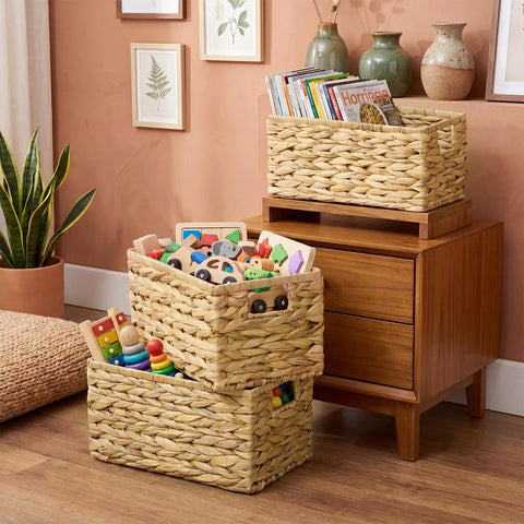 Three Pack Wicker Storage Baskets With Handles For Laundry Room And Bedroom Water Hyacinth Woven Bins Medium Size filled with toys