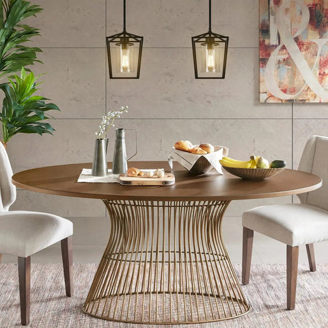 Black Farmhouse Kitchen Island Pendant Light With Metal Cage And Clear Glass Shade over a dining table