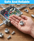 Heavy Duty Zinc Wire Clamps Bulk Pack Of Fifty Secure Electrical Box Connectors With Ironclad Strain Relief Fittings in hand.