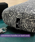 Beefy Rectangular Yoga Bolster For Deep Restorative Poses Ultra Firm Foam Core With Cotton Cover Handmade In The USA Black 25 In By 11 In By 5 In 5 Lb Restorative Pillow You Can Count On, side view with handle