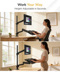Slick Sit Stand Monitor Arm With Keyboard Tray For Up To 32 Inch Displays, Height Adjustable Gas Spring Desk Mount, Smooth Articulating Rig For Your Daily Work Grind, No Sweat Clamping Or Grommet Base In Classic Black in use showing height adjustments.
